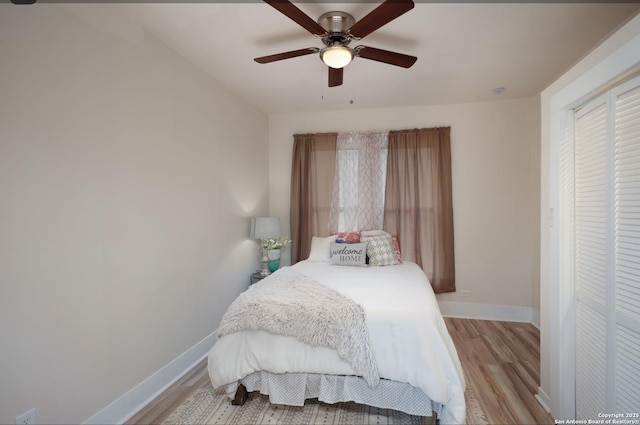 bedroom featuring ceiling fan and light hardwood / wood-style floors