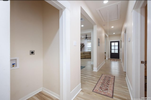 corridor featuring light wood-type flooring