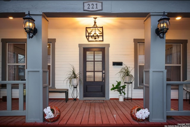 property entrance featuring a porch