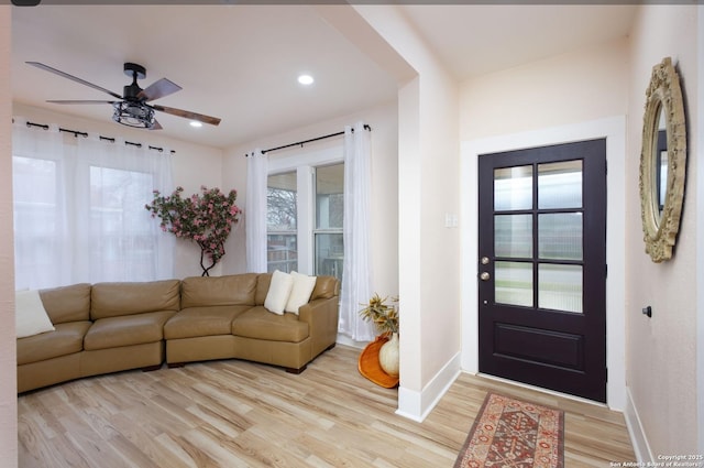 entryway featuring light hardwood / wood-style floors and ceiling fan