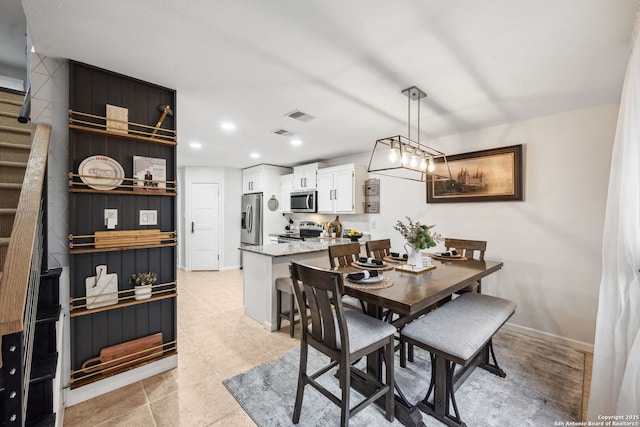 view of tiled dining space