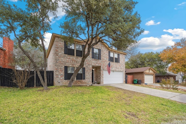 view of front facade with a front lawn and a garage