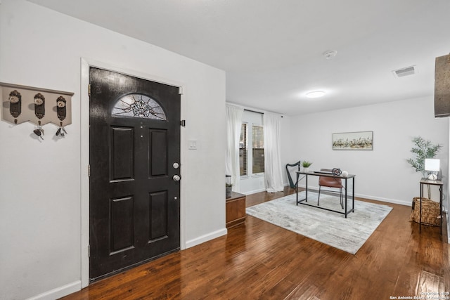 foyer entrance featuring hardwood / wood-style floors