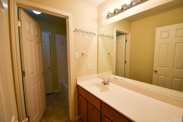 bathroom featuring bathing tub / shower combination, tile patterned floors, and vanity