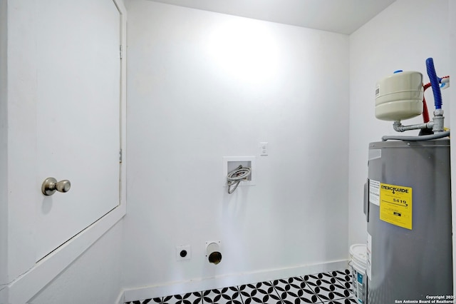 laundry area featuring electric water heater, washer hookup, and electric dryer hookup