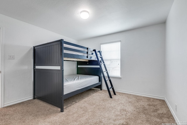 unfurnished bedroom with light carpet