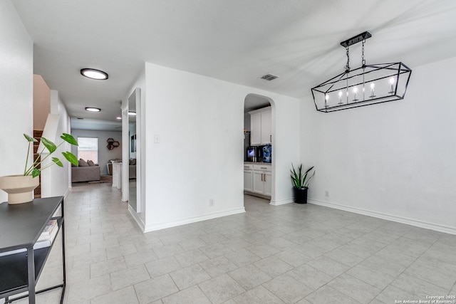 interior space featuring a notable chandelier