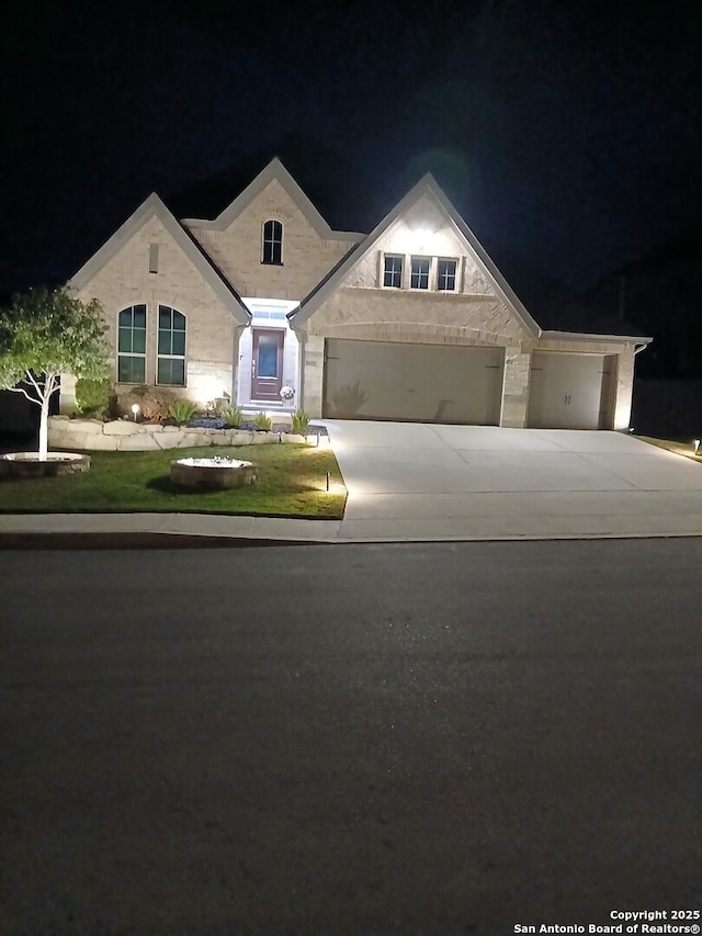 view of front of property with a garage