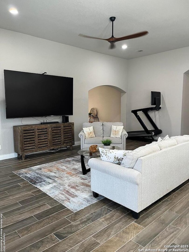 living room with ceiling fan