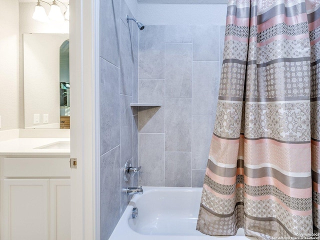 bathroom with vanity and shower / bathtub combination with curtain