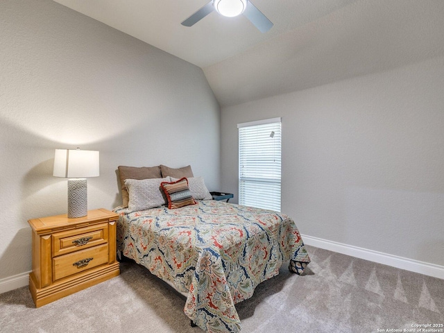 carpeted bedroom with lofted ceiling and ceiling fan