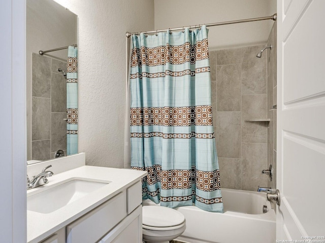 full bathroom featuring vanity, toilet, and shower / tub combo