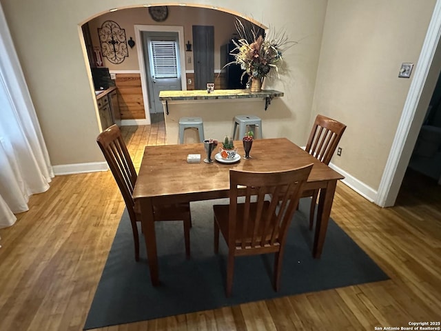 dining space featuring light hardwood / wood-style flooring