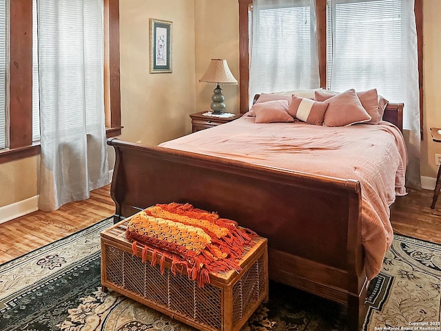 bedroom featuring hardwood / wood-style floors