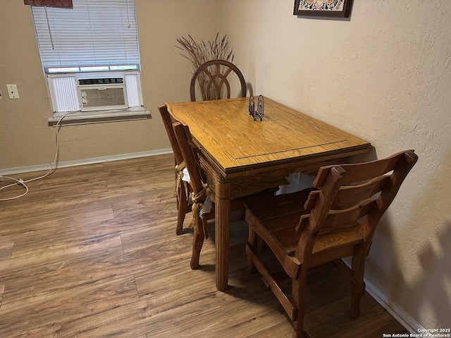 dining room featuring wood-type flooring