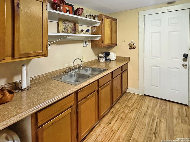 kitchen featuring light hardwood / wood-style floors and sink