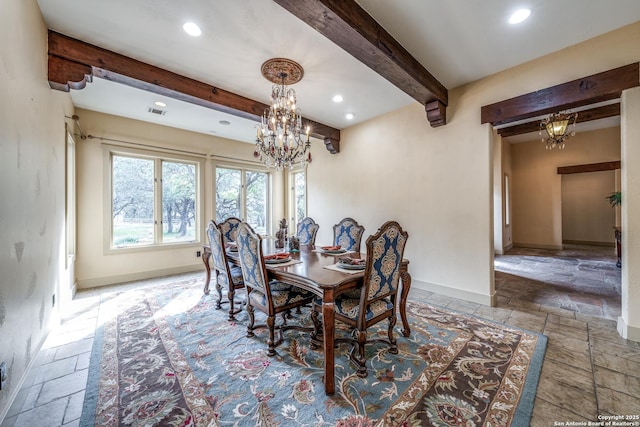 dining area with a notable chandelier and beamed ceiling