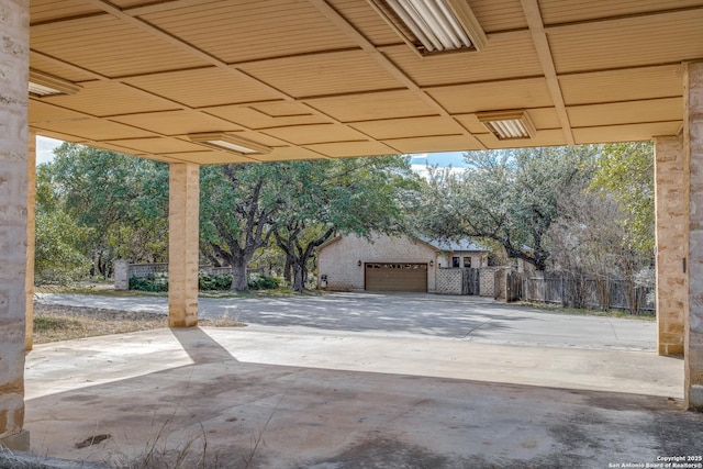 view of patio / terrace with a garage