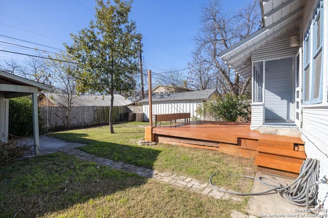 view of yard with a wooden deck