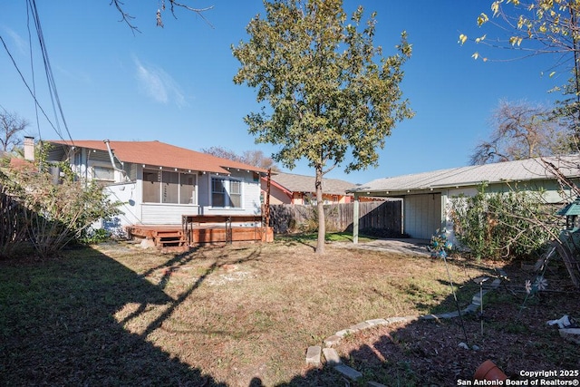 view of yard featuring a sunroom