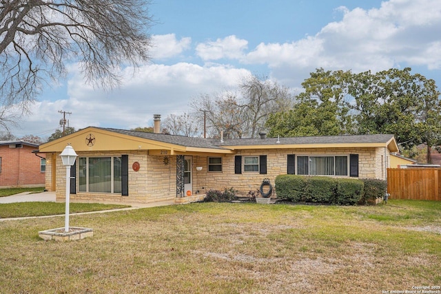 ranch-style house with a front yard