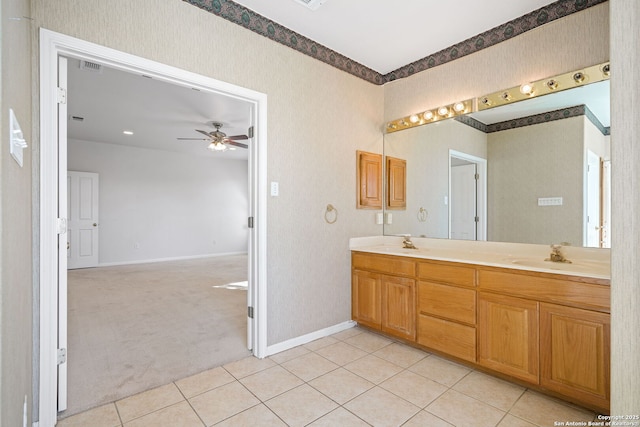 bathroom featuring vanity, ceiling fan, and tile patterned floors