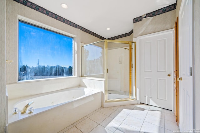 bathroom with tile patterned floors and separate shower and tub