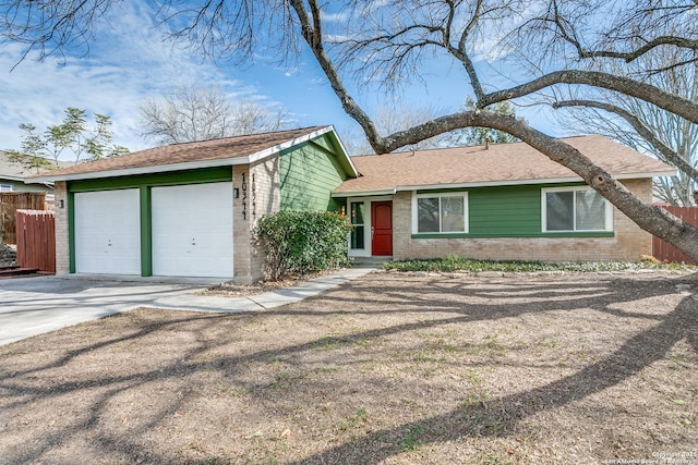 ranch-style home with a garage