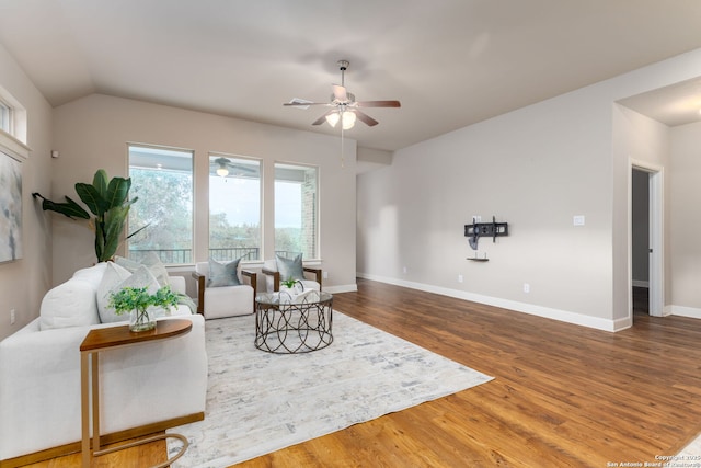 sitting room featuring ceiling fan, vaulted ceiling, and hardwood / wood-style flooring