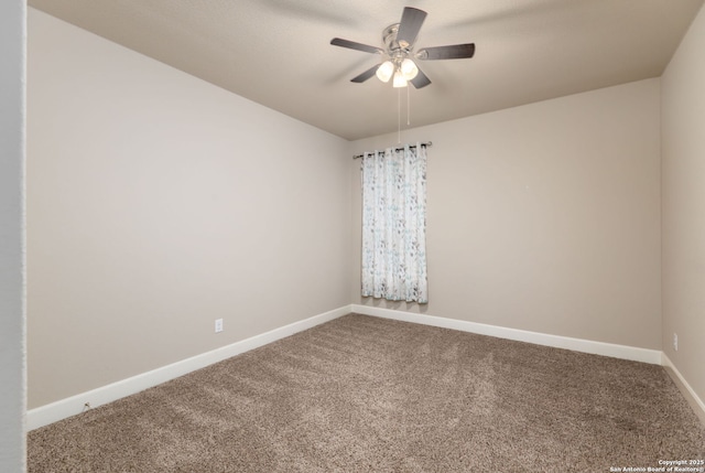 empty room with ceiling fan and carpet flooring