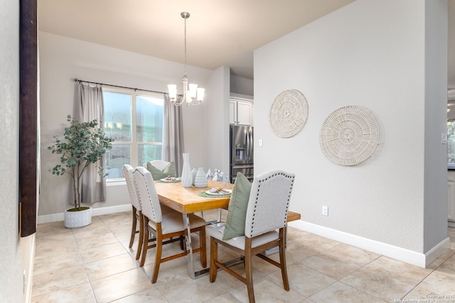 dining area featuring a chandelier