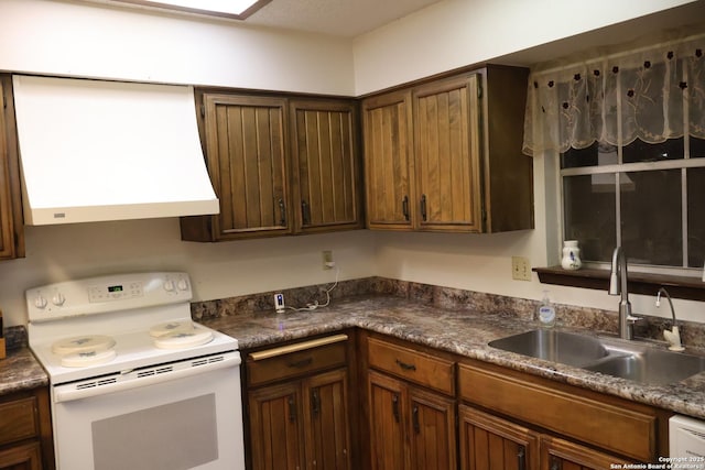 kitchen featuring custom exhaust hood, sink, and white appliances