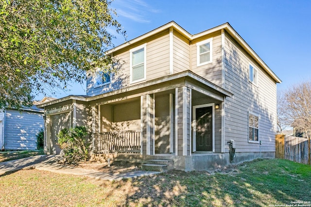 view of front of property with a front lawn and a porch