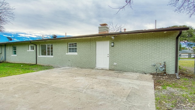 rear view of property with a patio