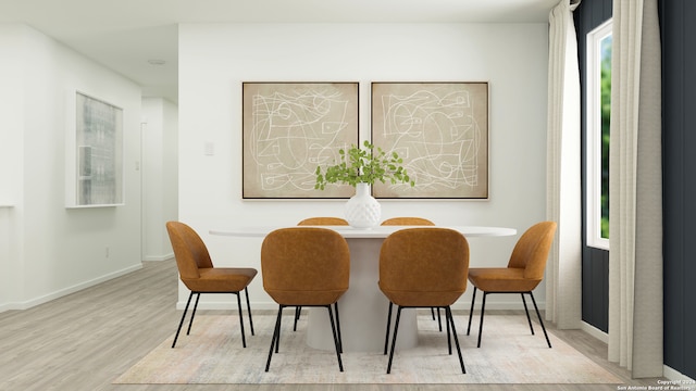 dining space featuring light hardwood / wood-style flooring