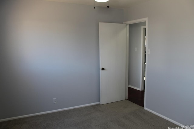 unfurnished room with carpet flooring