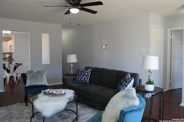 living room with ceiling fan and hardwood / wood-style floors