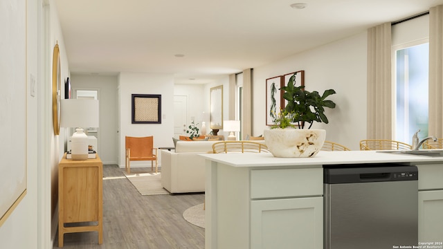 kitchen with dishwasher, sink, refrigerator, and light hardwood / wood-style floors