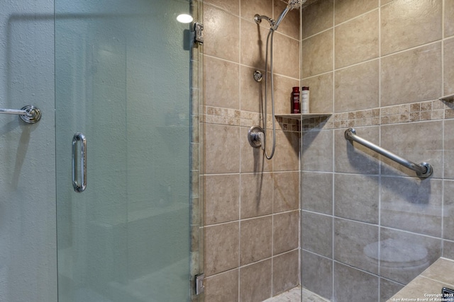 bathroom with an enclosed shower