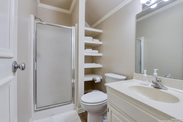 bathroom featuring crown molding, vanity, toilet, and an enclosed shower