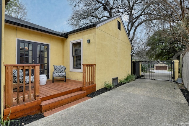 view of side of home featuring a deck