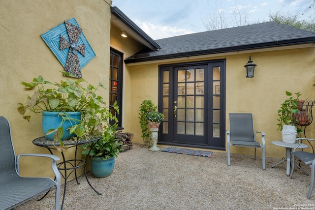 doorway to property with a patio