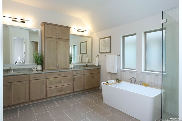 28411 Cohaset Way, San Antonio, TX 78260 - bathroom featuring double vanity, a soaking tub, and vaulted ceiling