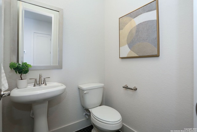 28411 Cohaset Way, San Antonio, TX 78260 - bathroom featuring baseboards and toilet