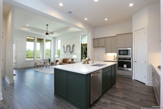 28411 Cohaset Way, San Antonio, TX 78260 - kitchen featuring stainless steel appliances, a sink, gray cabinetry, recessed lighting, and dark wood-style floors