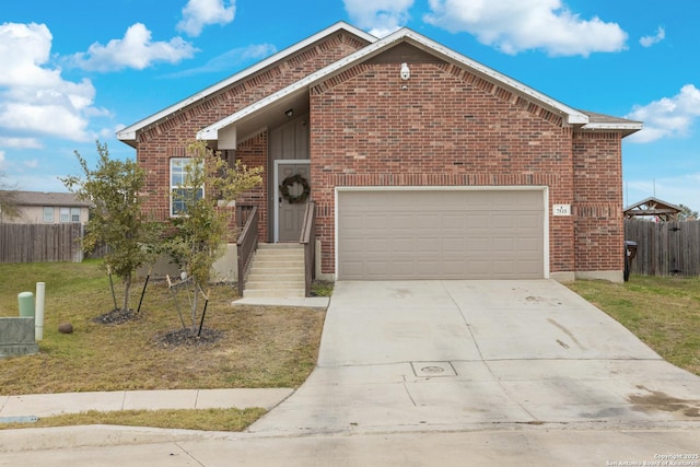 front of property with a garage and a front yard