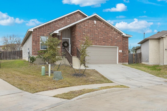 front facade featuring a garage and a front yard