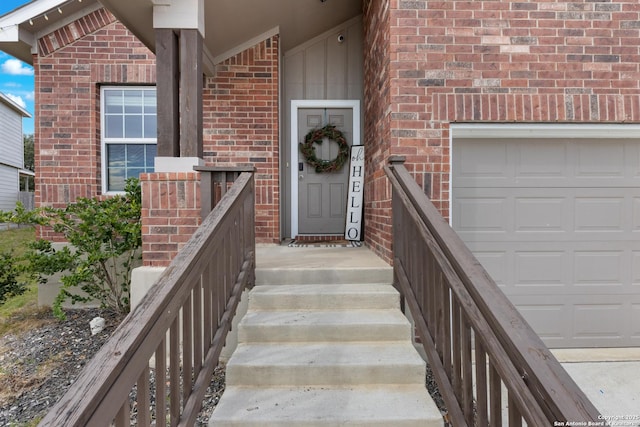 doorway to property featuring a garage