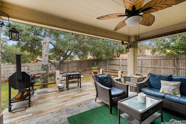 exterior space with ceiling fan