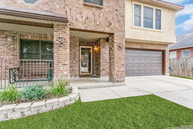 doorway to property featuring a garage